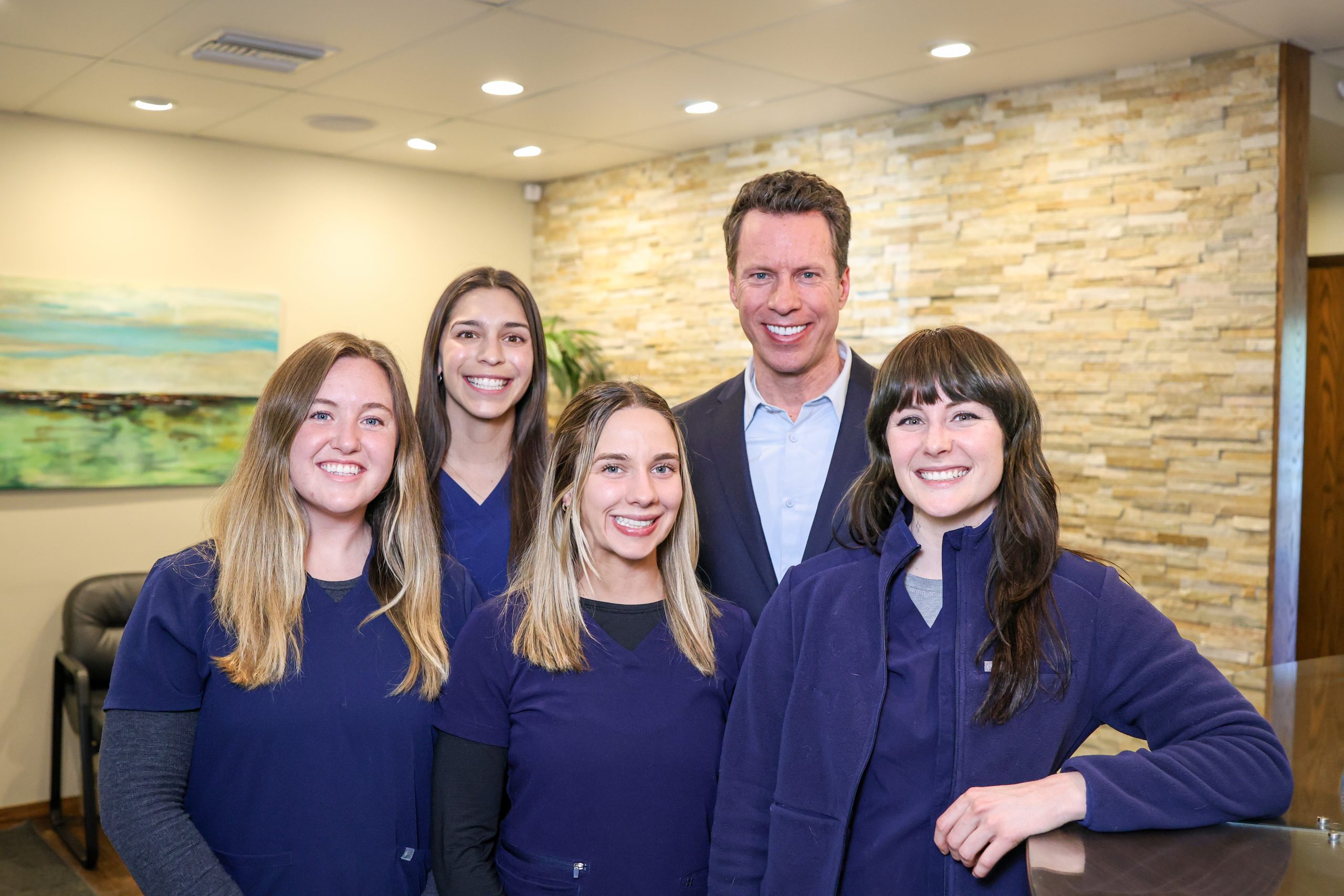 Chiropractor Evergreen CO Jason Steinle With Staff 2025
